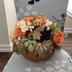 Great floral centerpiece. Great for table or shelf. Pumpkin planter